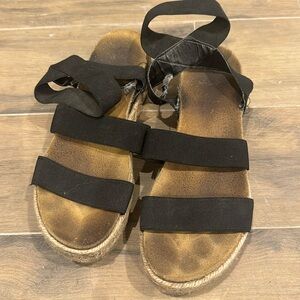Black and tan sandal platforms